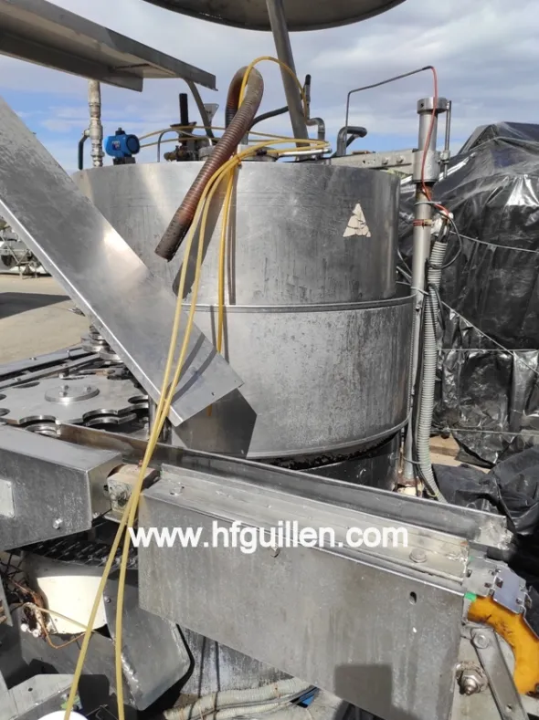 AGGRAFFATRICE FMC A 4 TESTE CON RIEMPITRICE SOTTOVUOTO