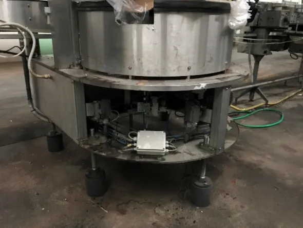 ETICHETTATRICE AUTOMATICA ROTATIVA AUTOADESIVA
