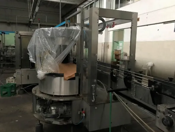 ETICHETTATRICE AUTOMATICA ROTATIVA AUTOADESIVA