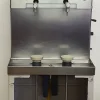 Imbottigliatrice pneumatica a due teste.