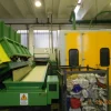 Impianto di trattamento contenitori post-consumo di plastica con recupero di resina termoplastica