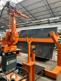 Isola robot ABB per saldatura testata con garanzia