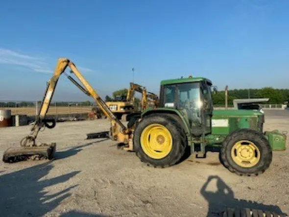 John Deere 6310 AS/1 con braccio Ferri