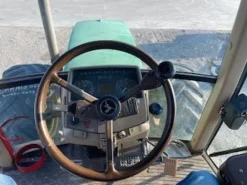 John Deere 6310 AS/1 con braccio Ferri