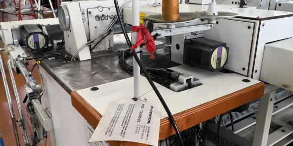 Macchina automatica per applicazione tasche
