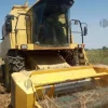 1#9176 Mietitrebbia New Holland TX64 e barre