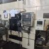 Muratec MW12 x2 con gantry tornio CNC bimandrino