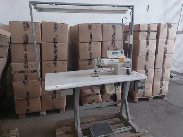 1#8180 Rimanenze di magazzino abbigliamento e macchine per confezionamento