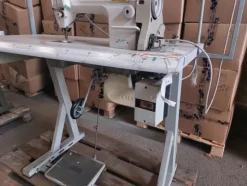 1#8180 Rimanenze di magazzino abbigliamento e macchine per confezionamento
