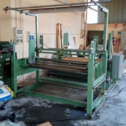 Sbobinatore o avvolgitore robusto per bobina tessuti