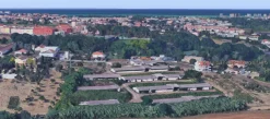TERRENO CON COMPLESSO AZIENDALE CON VARI CAPANNONI