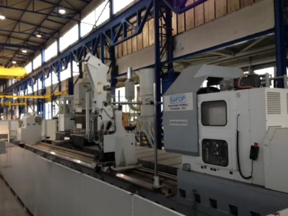 Tornio Safop 2000 x14000 con rettifica, fresa e asse y.