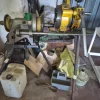 tornio, scaffali, trapani, troncatrici e altri attrezzi